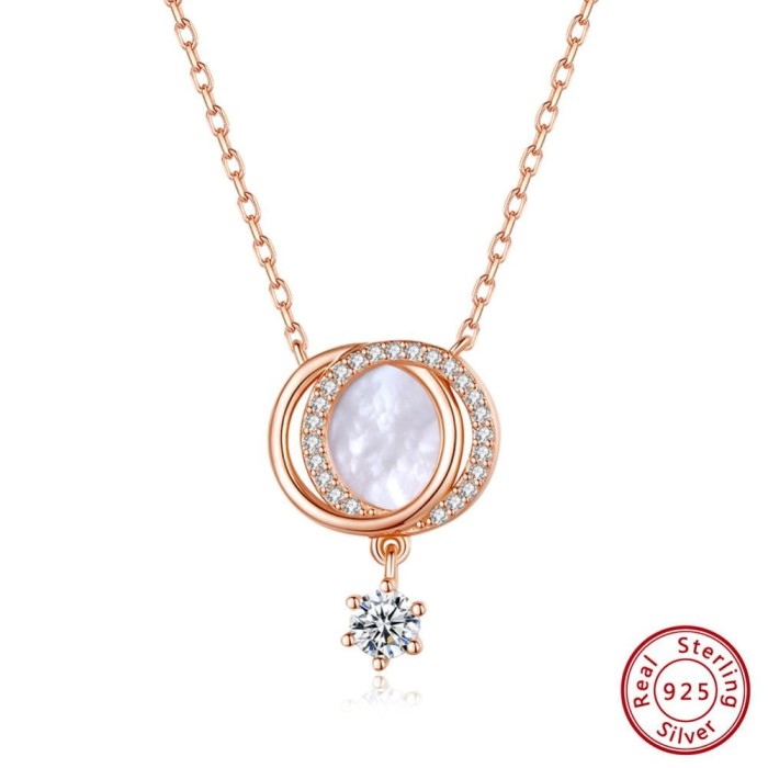 Pozłacany naszyjnik ze srebra 925 z muszlą i cyrkonią AAAA klasy. Romantyczny połysk i kobieca elegancja.